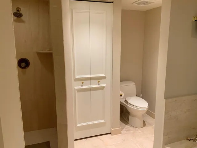 a view of a lake with a flower in a garden