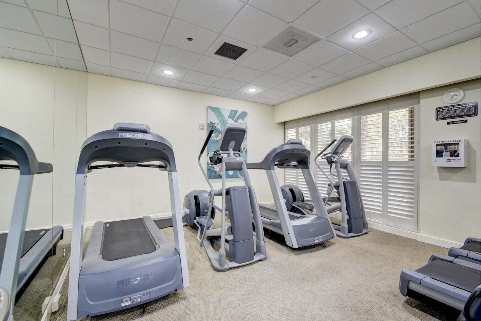 4201 North Ocean Boulevard, Unit 1705 Boca Raton, FL 33431 - Photo 26 of 37 a view of a room with gym equipment