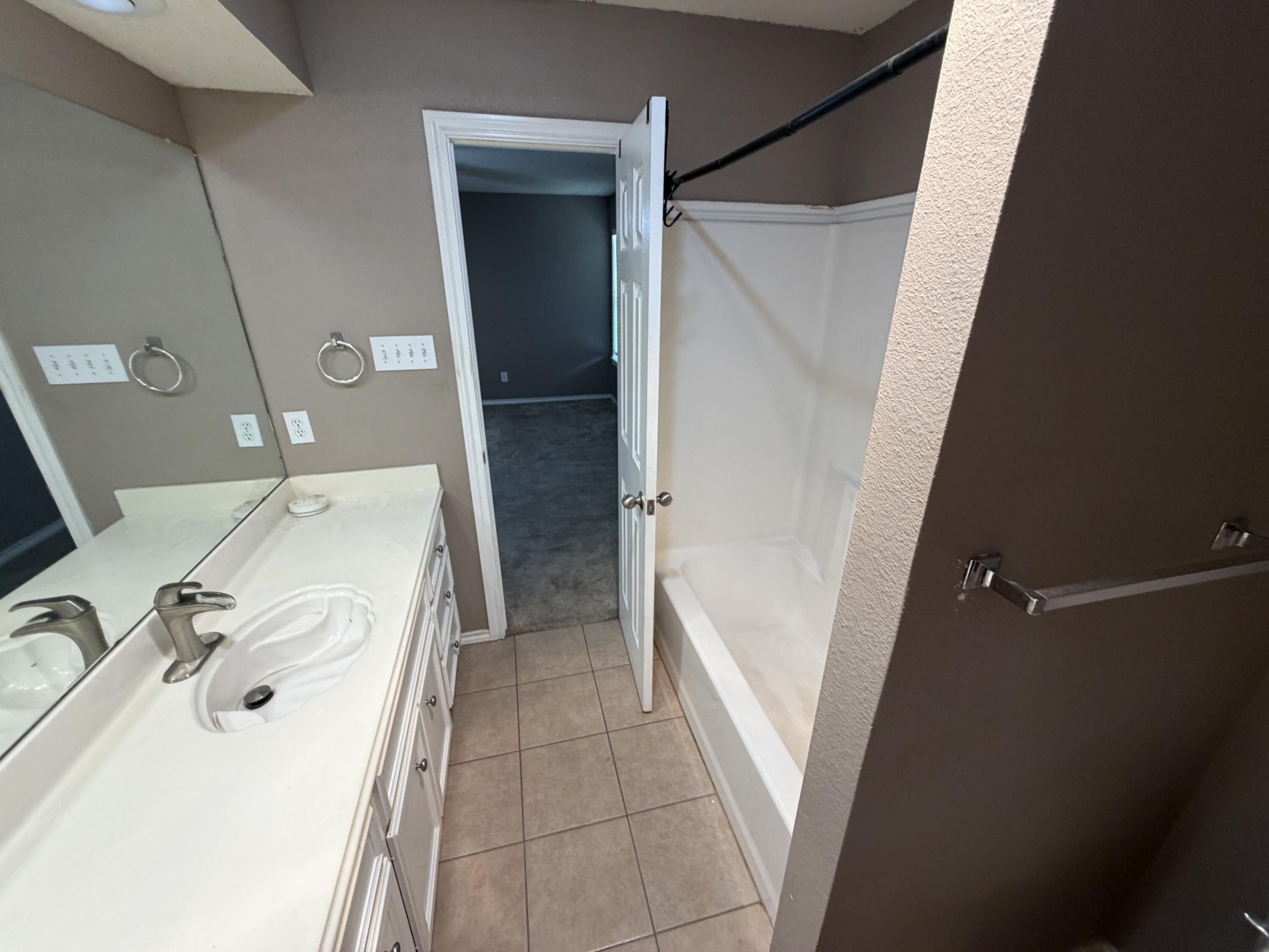 1430 78th Street Lubbock, TX 79423 - Photo 8 of 14 Primary Bath Other View