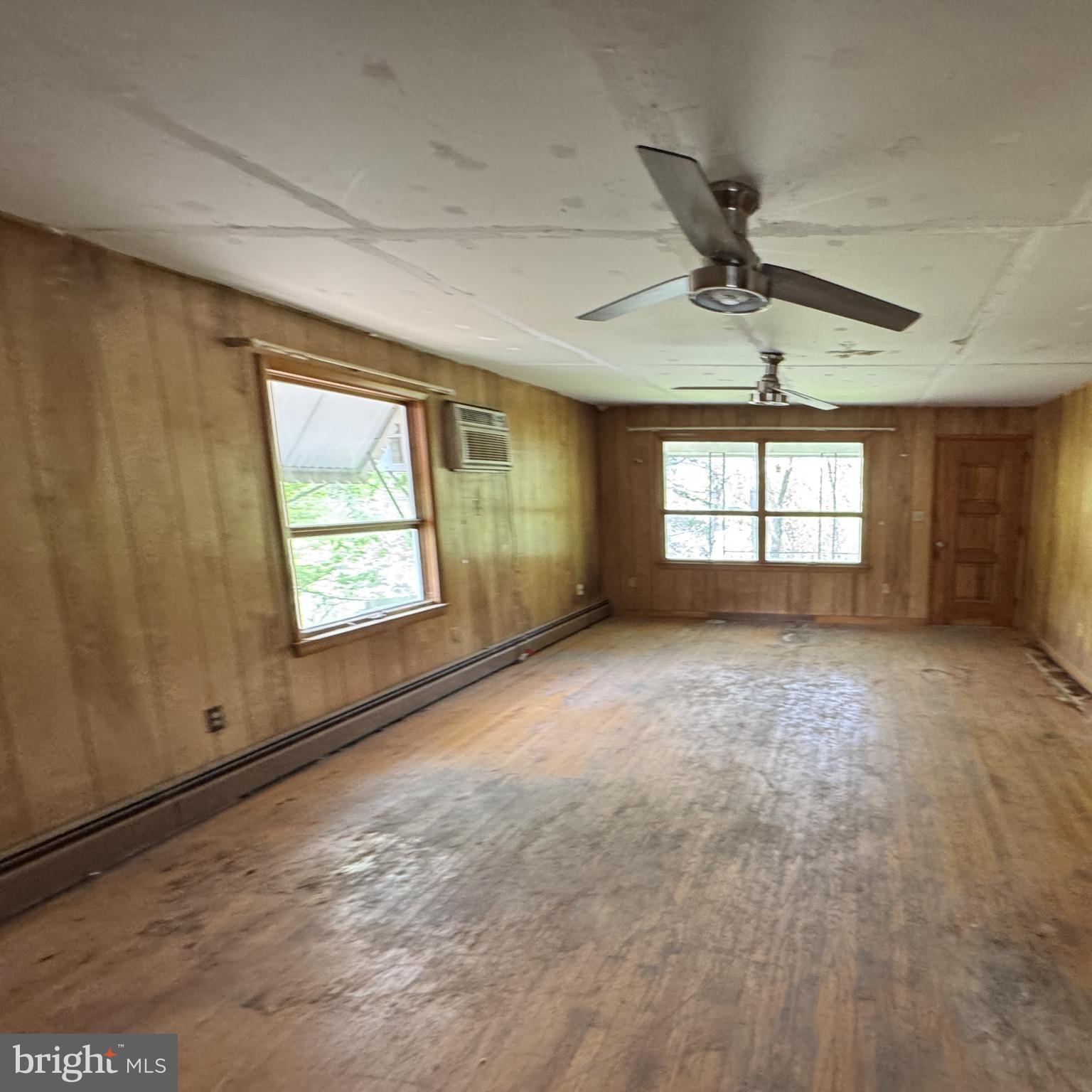 85 Ralph Barnes Lane Fort Ashby, WV 26719 - Photo 6 of 15 a view of an empty room with a window