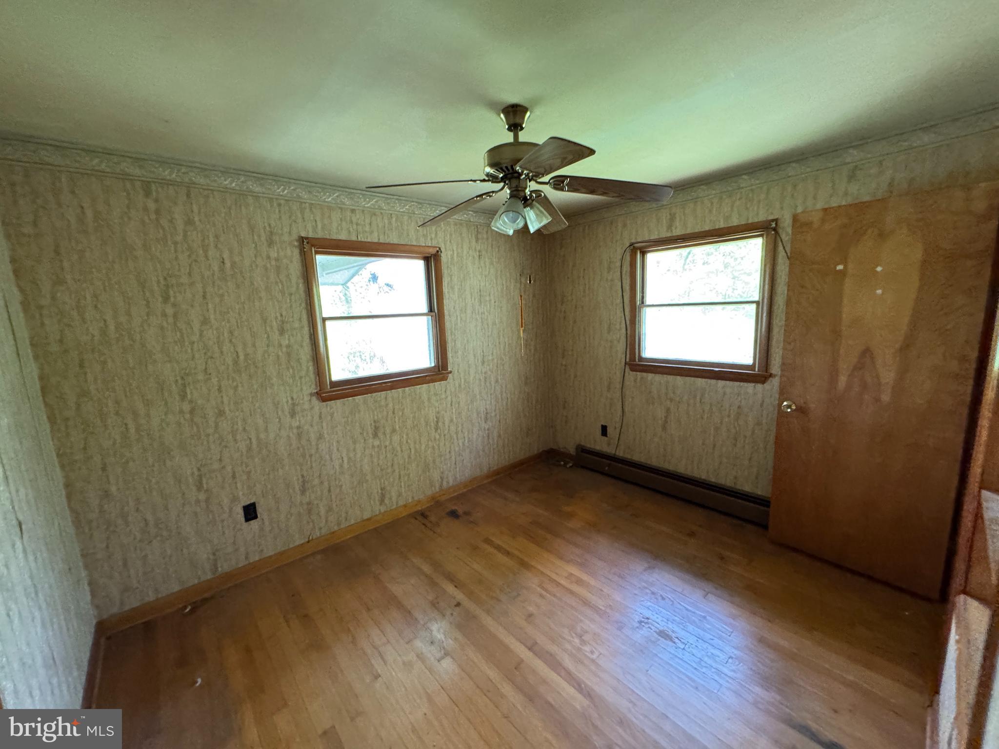85 Ralph Barnes Lane Fort Ashby, WV 26719 - Photo 8 of 15 a view of an empty room with a window