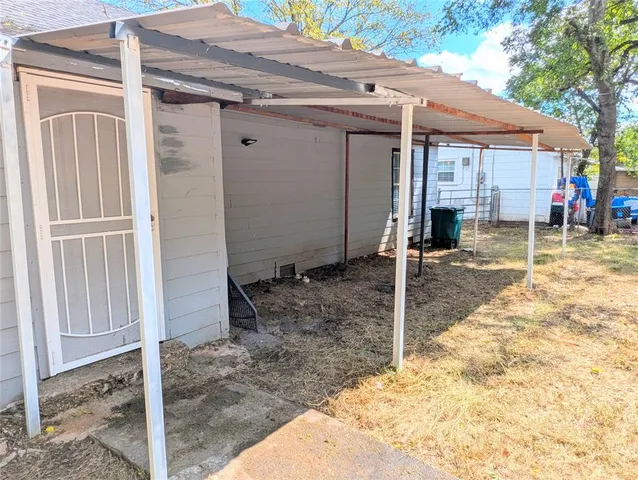 a view of a house with patio