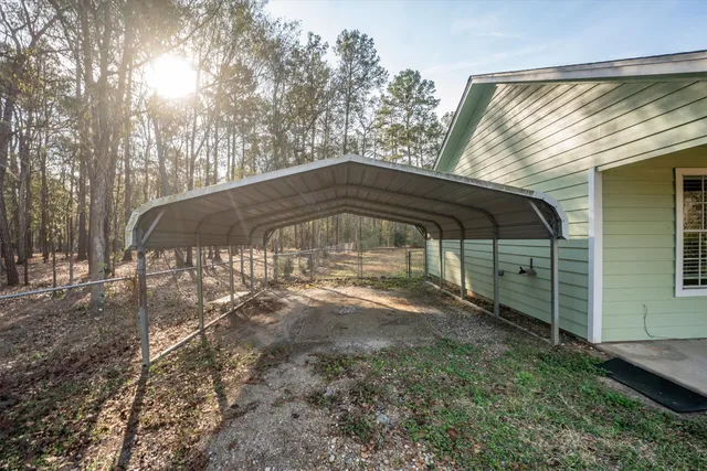 a view of backyard with green space
