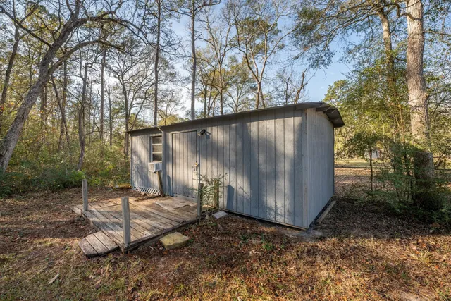 a backyard of a house with lots of green space