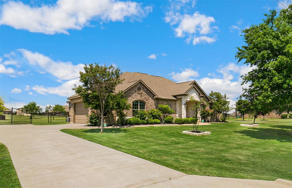 9410 Eakin Cemetery Road DISH, TX 76247 - Photo 1 of 1 a front view of a house with a yard