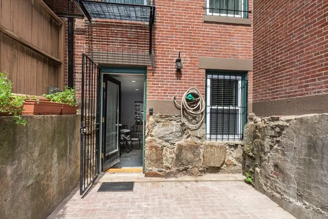 a front view of a house with a glass door