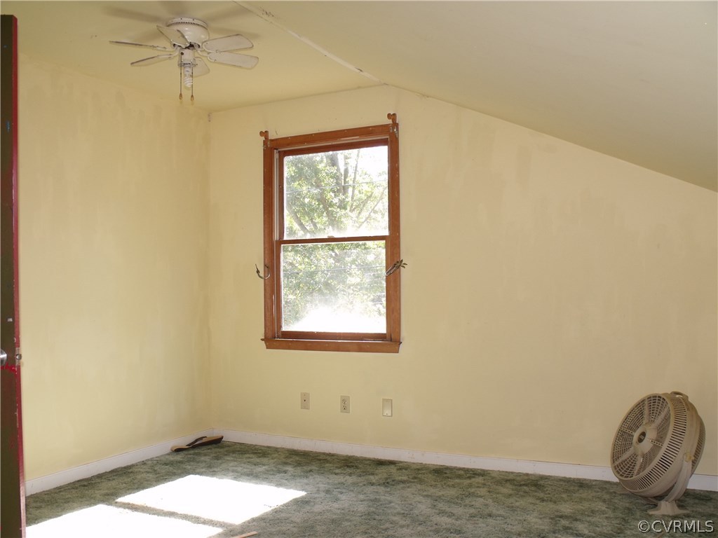 14830 Harrowgate Road Chester, VA 23831 - Photo 14 of 14 an empty room with a window