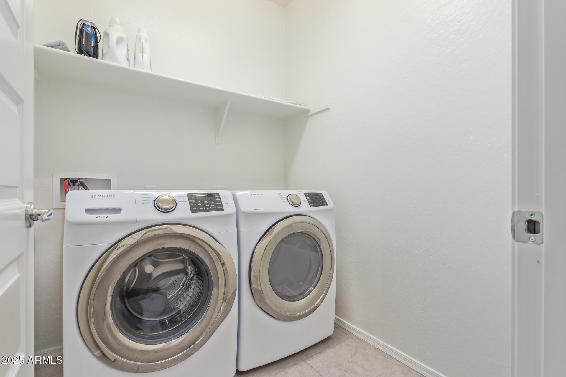 17796 West Sandy Road Goodyear, AZ 85338 - Photo 34 of 68 a utility room with dryer and washer