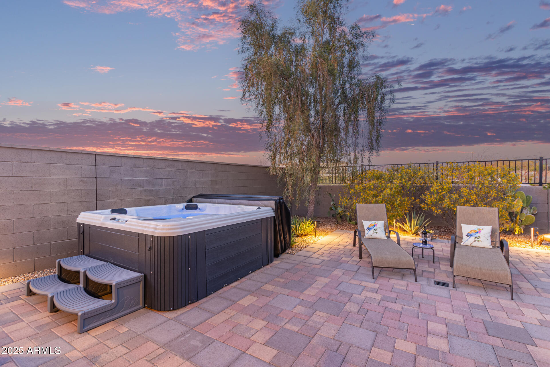 17796 West Sandy Road Goodyear, AZ 85338 - Photo 42 of 68 a view of a patio with iron fence