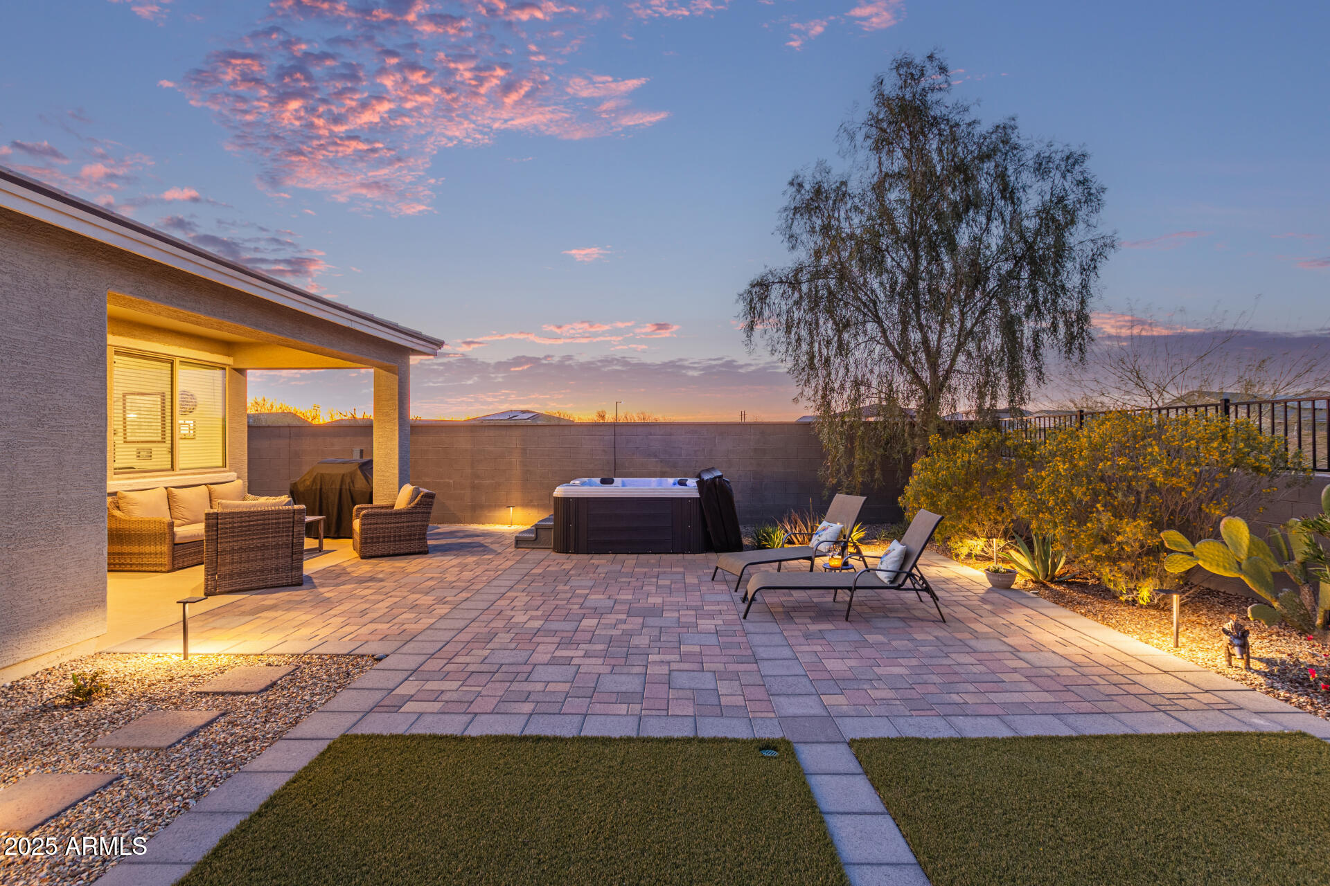 17796 West Sandy Road Goodyear, AZ 85338 - Photo 50 of 68 a swimming pool with outdoor seating and a patio