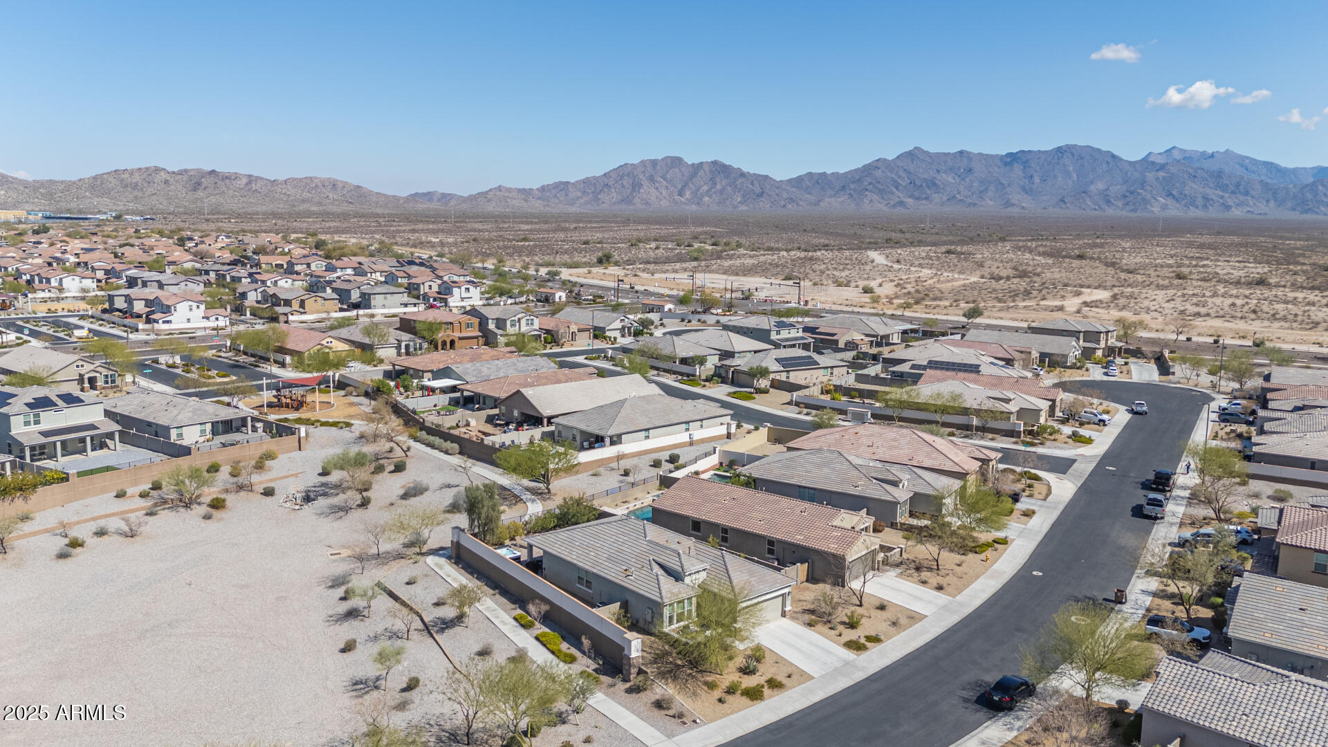 17796 West Sandy Road Goodyear, AZ 85338 - Photo 5 of 68 a view of a city with a lake