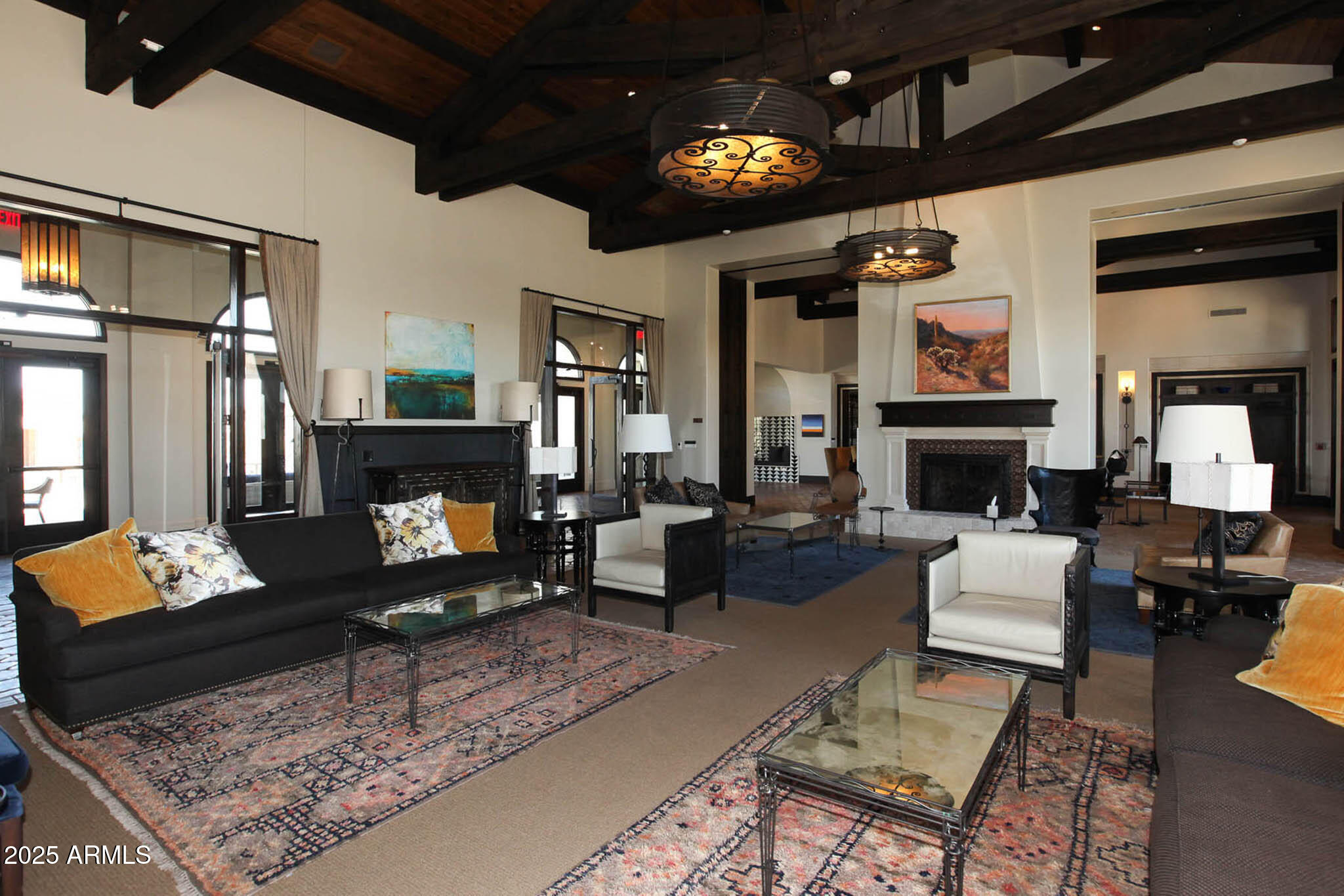 17796 West Sandy Road Goodyear, AZ 85338 - Photo 59 of 68 a living room with furniture and a fireplace