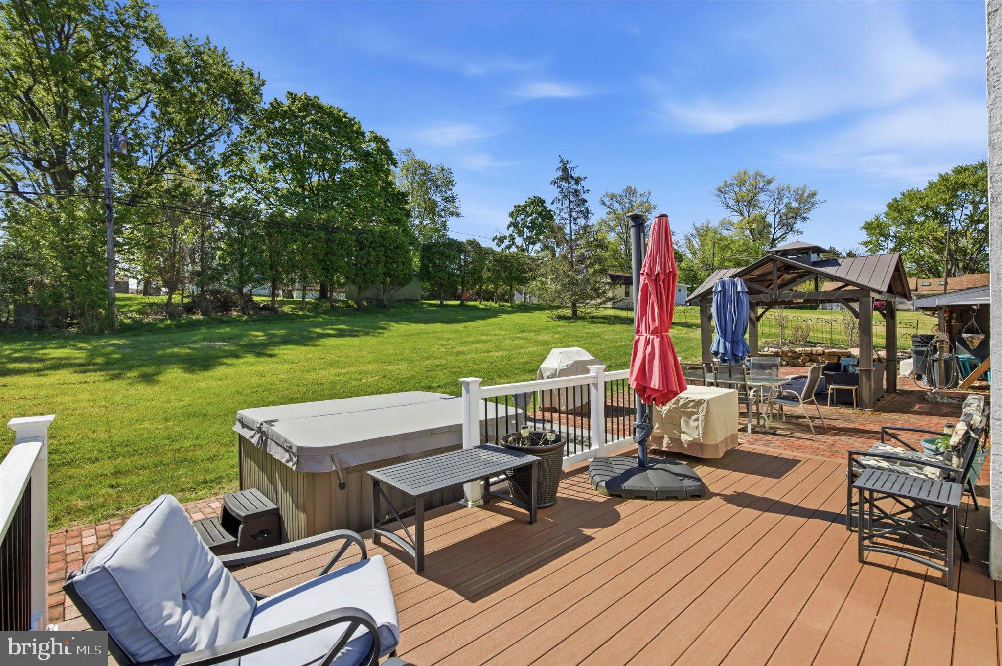 120 Harry Road Eagleville, PA 19403 - Photo 4 of 7 Serene backyard retreat with lush greenery.