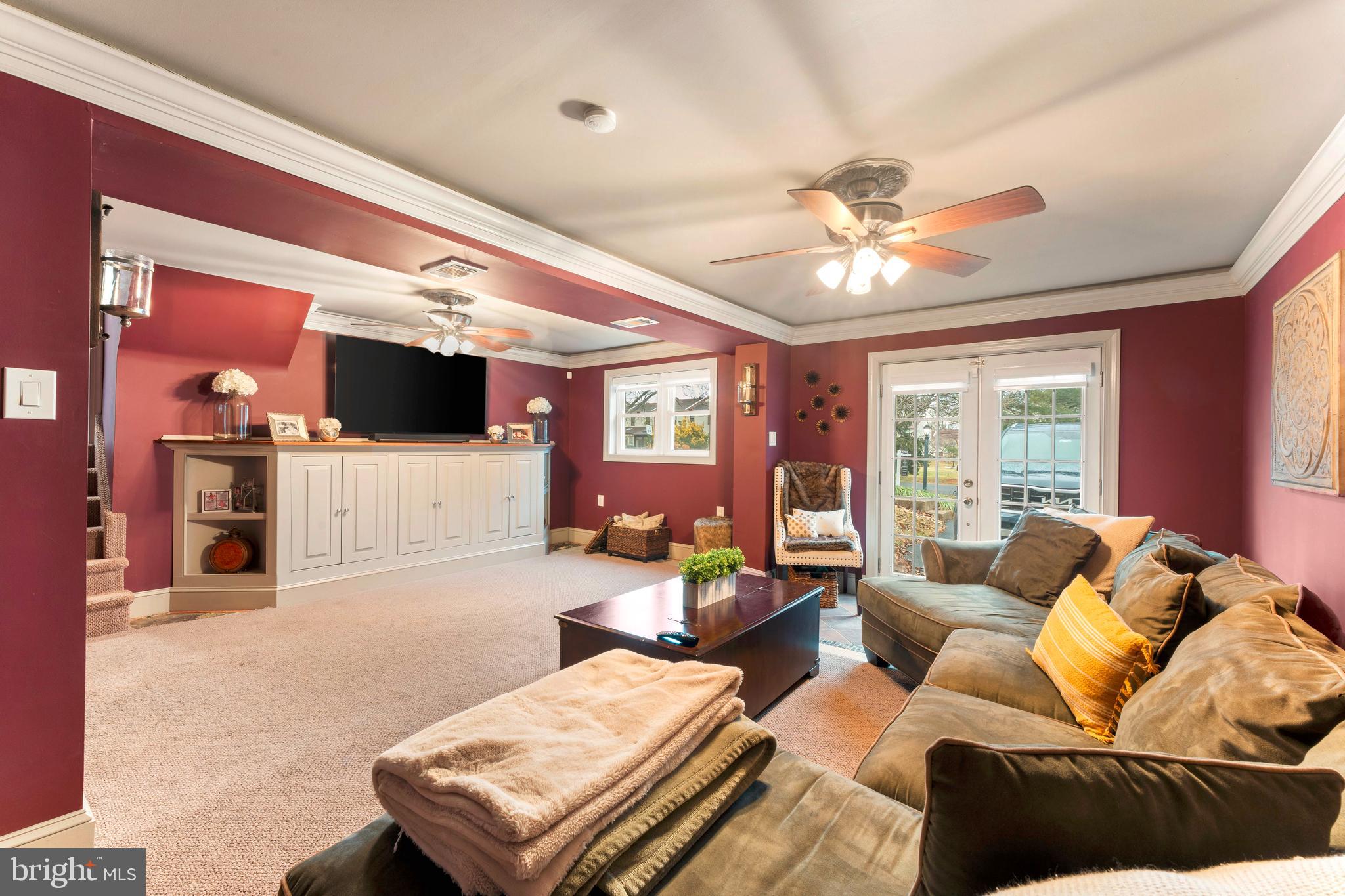 992 Jamison Street Warminster, PA 18974 - Photo 17 of 37 a living room with furniture and a flat screen tv