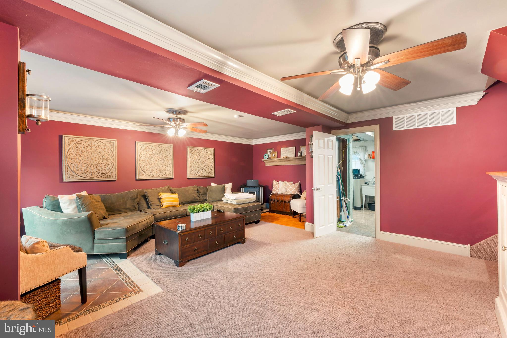 992 Jamison Street Warminster, PA 18974 - Photo 18 of 37 a living room with furniture and a chandelier