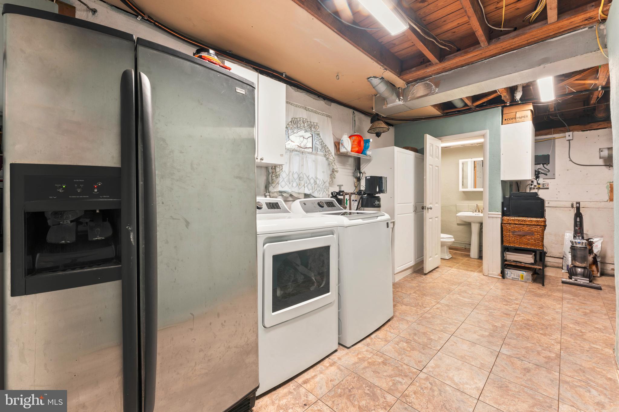 992 Jamison Street Warminster, PA 18974 - Photo 21 of 37 a kitchen with a stove and a refrigerator