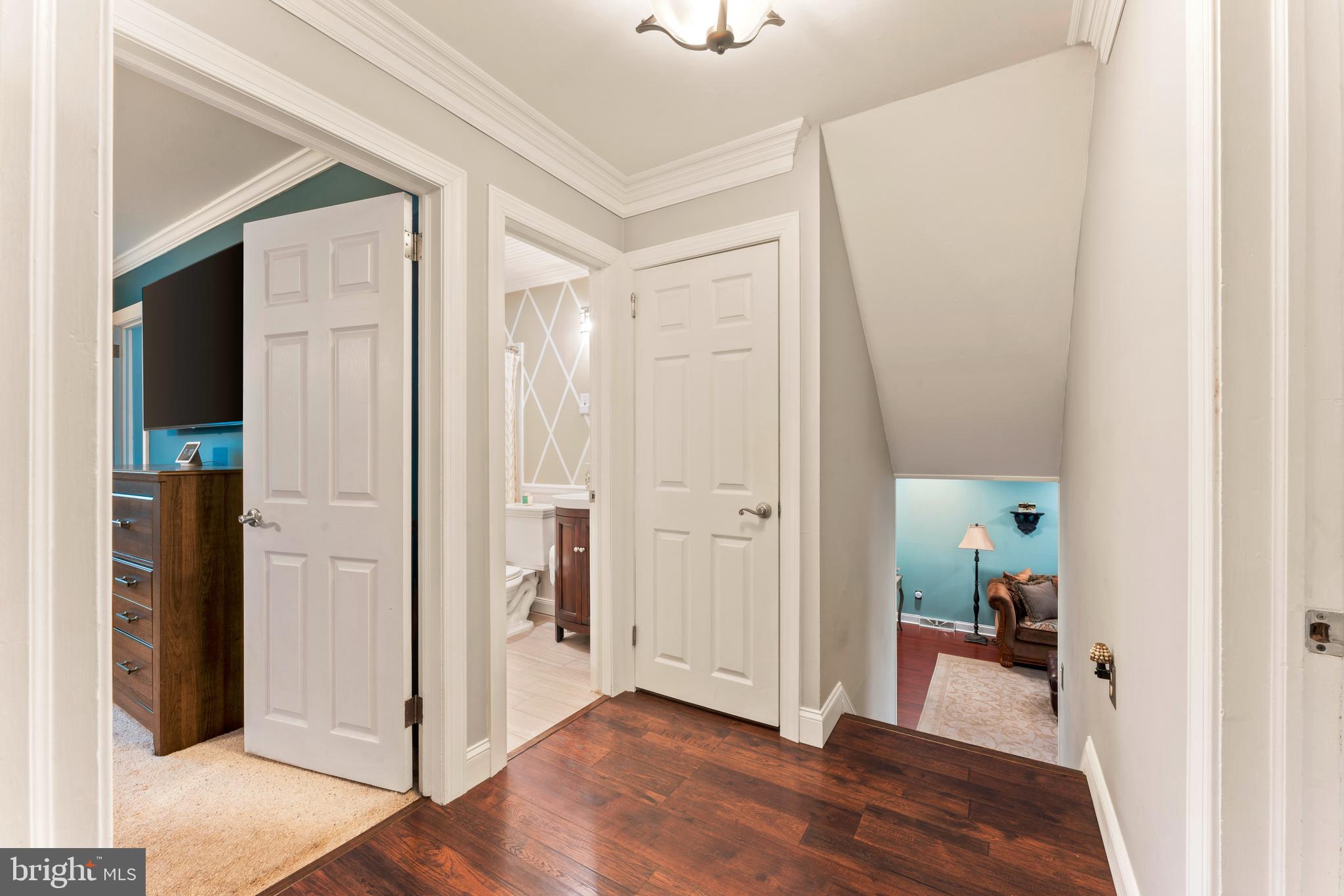 992 Jamison Street Warminster, PA 18974 - Photo 23 of 37 a view of a hallway view with wooden floor and staircase