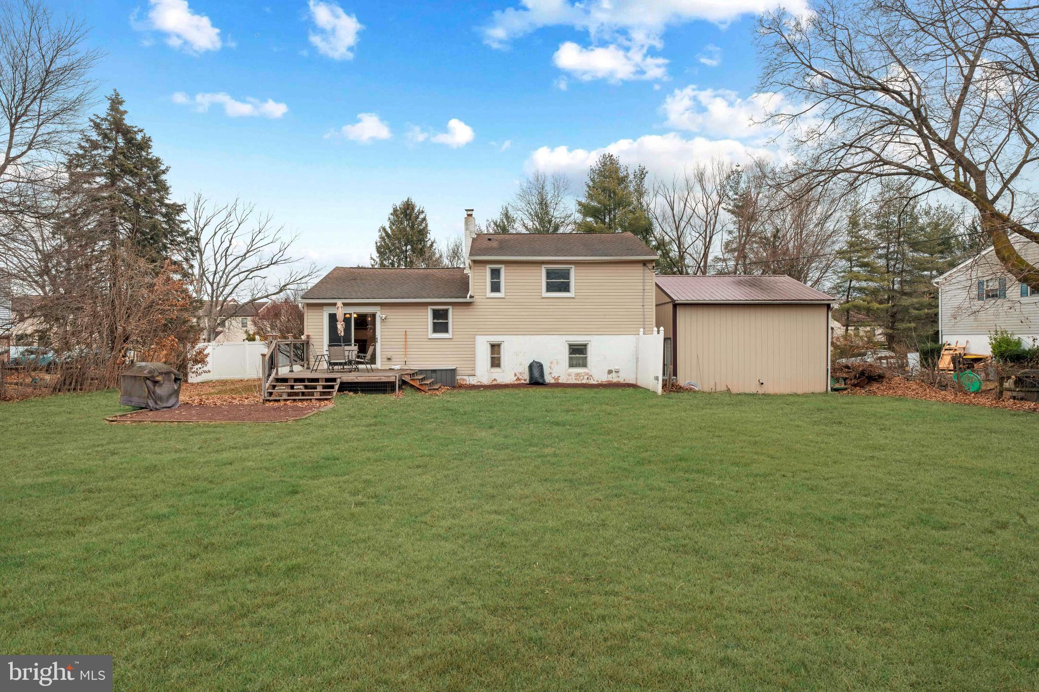 992 Jamison Street Warminster, PA 18974 - Photo 35 of 37 a front view of a house with a garden