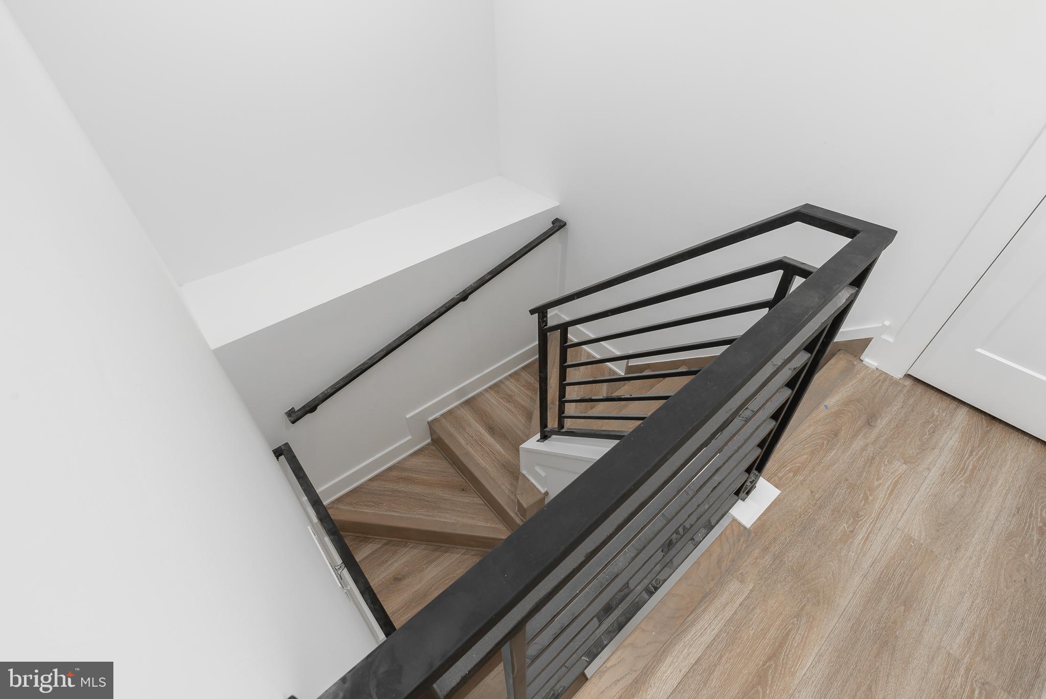 1931 East Huntingdon Street Philadelphia, PA 19125 - Photo 41 of 54 Stairwell to lower level bedrooms (Unit 1)