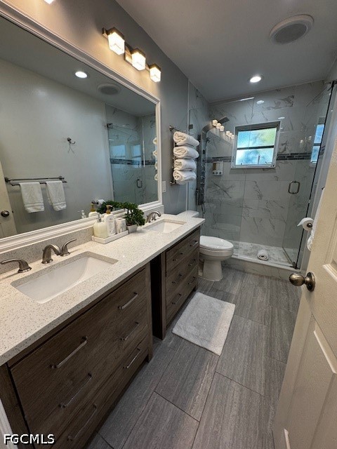 8409 Tahiti Road, Unit A Fort Myers, FL 33967 - Photo 13 of 23 a bathroom with a double vanity sink and a mirror