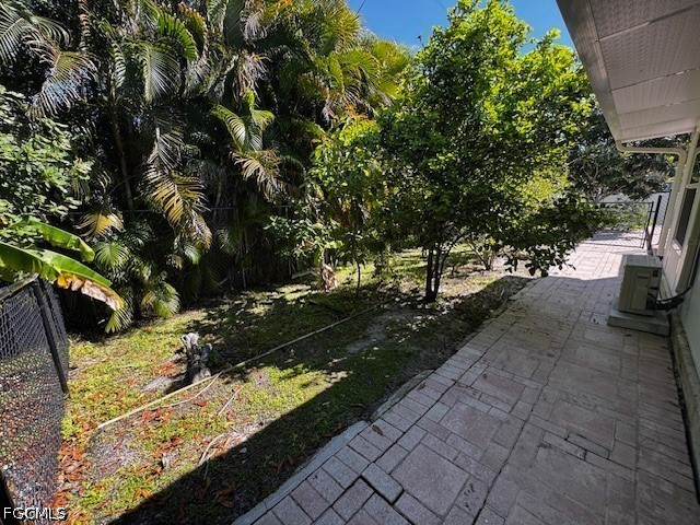 8409 Tahiti Road, Unit A Fort Myers, FL 33967 - Photo 22 of 23 a view of a yard with plants