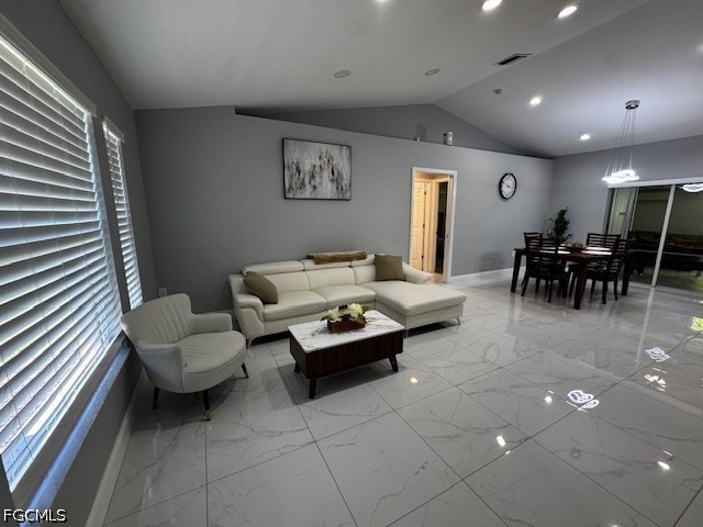 8409 Tahiti Road, Unit A Fort Myers, FL 33967 - Photo 4 of 23 a living room with furniture and a large window