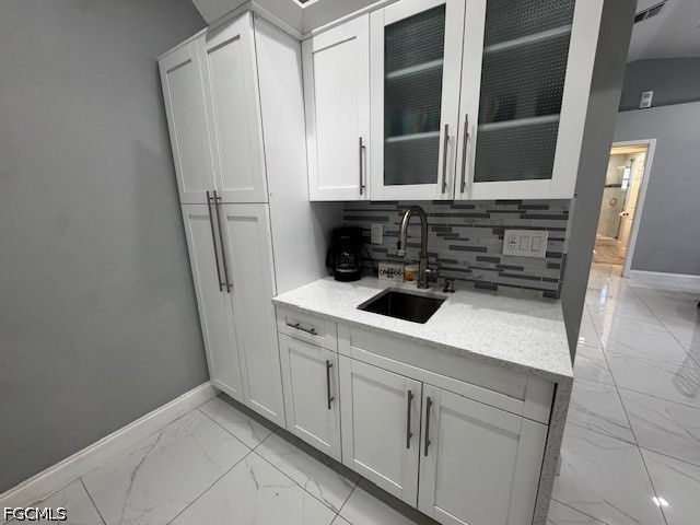 8409 Tahiti Road, Unit A Fort Myers, FL 33967 - Photo 8 of 23 a view of a refrigerator a sink and dishwasher with wooden floor