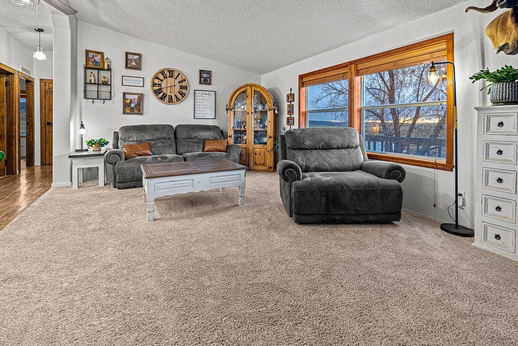 6181 Highway 394 Craig, CO 81625 - Photo 3 of 15 a living room with furniture and a large window