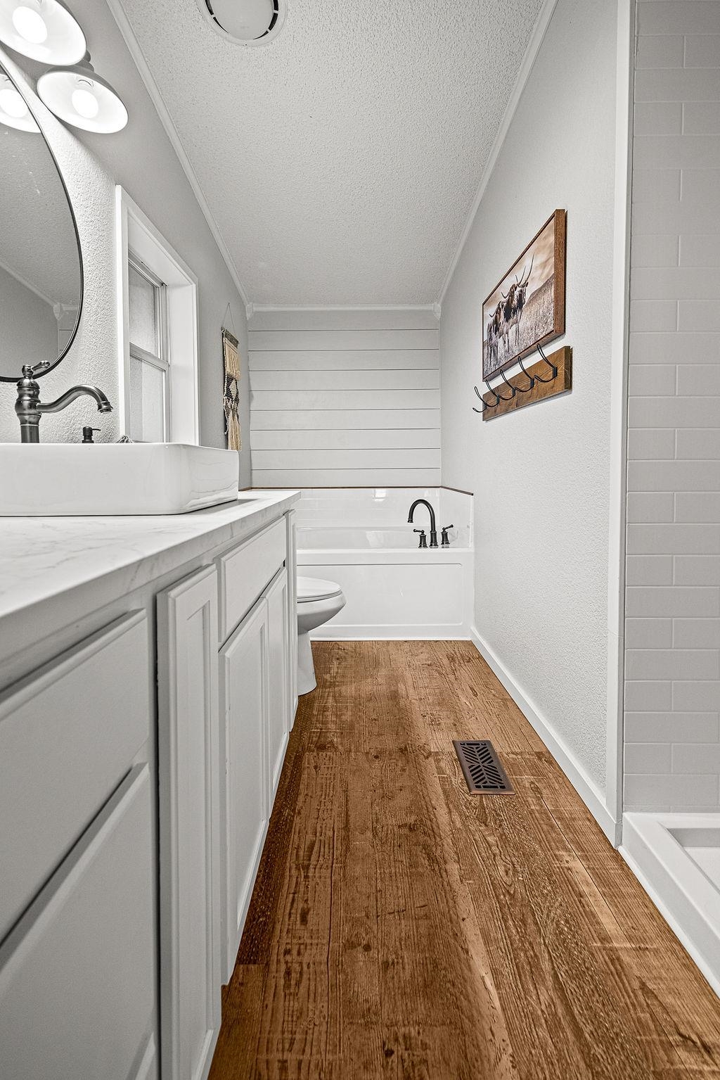 6181 Highway 394 Craig, CO 81625 - Photo 6 of 15 a bathroom with a sink and a mirror