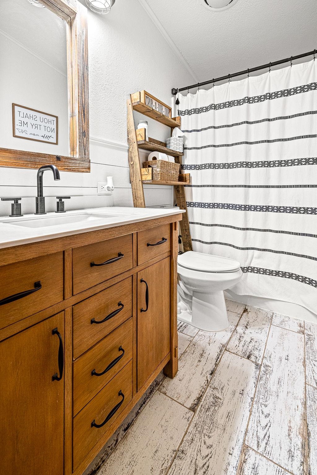 6181 Highway 394 Craig, CO 81625 - Photo 8 of 15 a bathroom with a sink toilet and shower