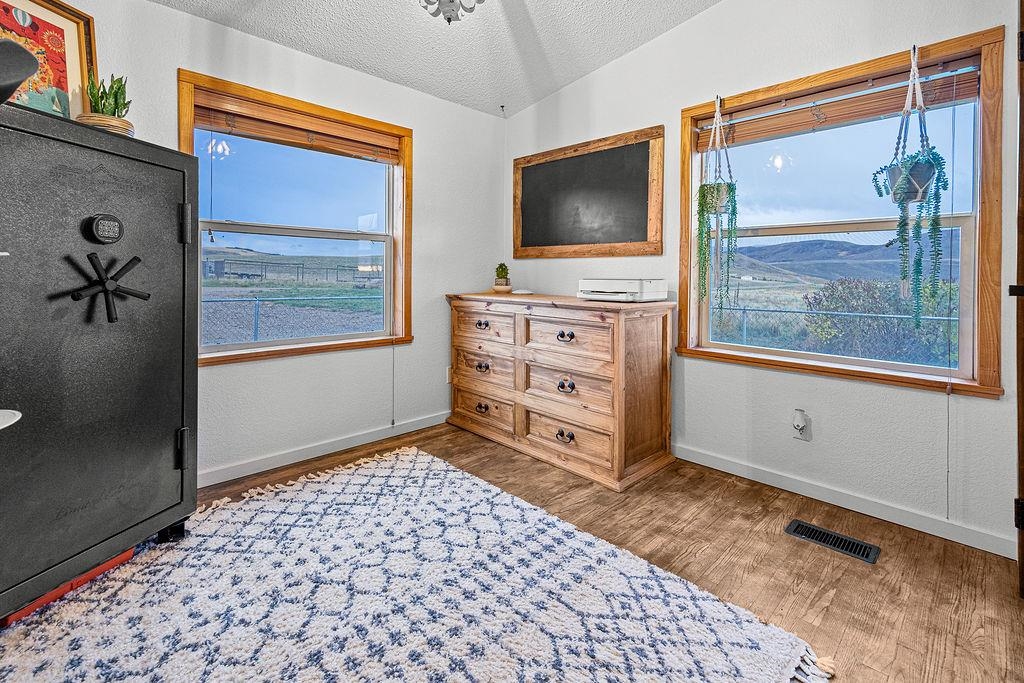 6181 Highway 394 Craig, CO 81625 - Photo 9 of 15 a room with furniture and flat screen tv