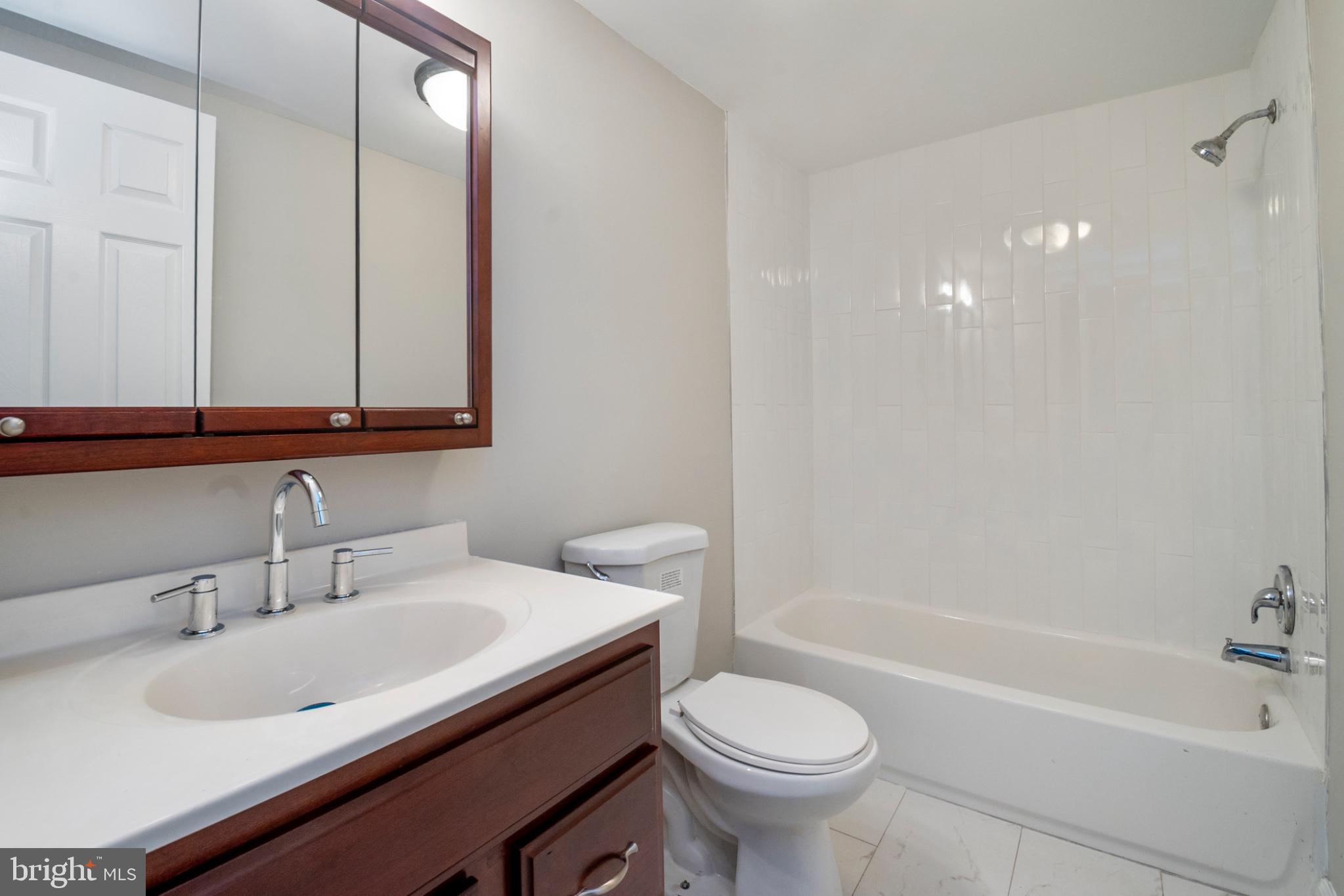 3708 7th Street Baltimore, MD 21225 - Photo 6 of 8 Modern bathroom with sleek finishes.