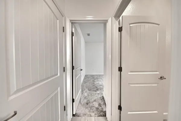 a view of a bathroom with a glass shower door