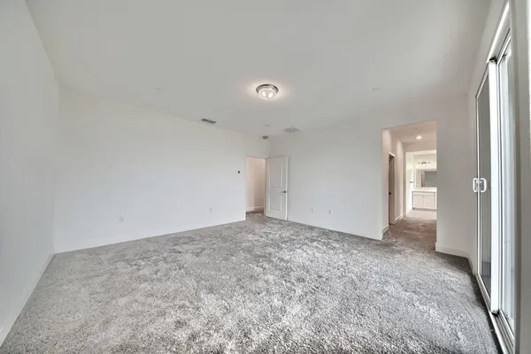 an empty room with a natural light