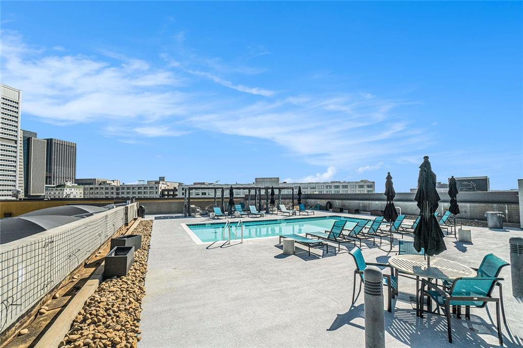 311 Nelson Street Southwest Atlanta, GA 30313 - Photo 19 of 27 a view of swimming pool with outdoor seating and city view