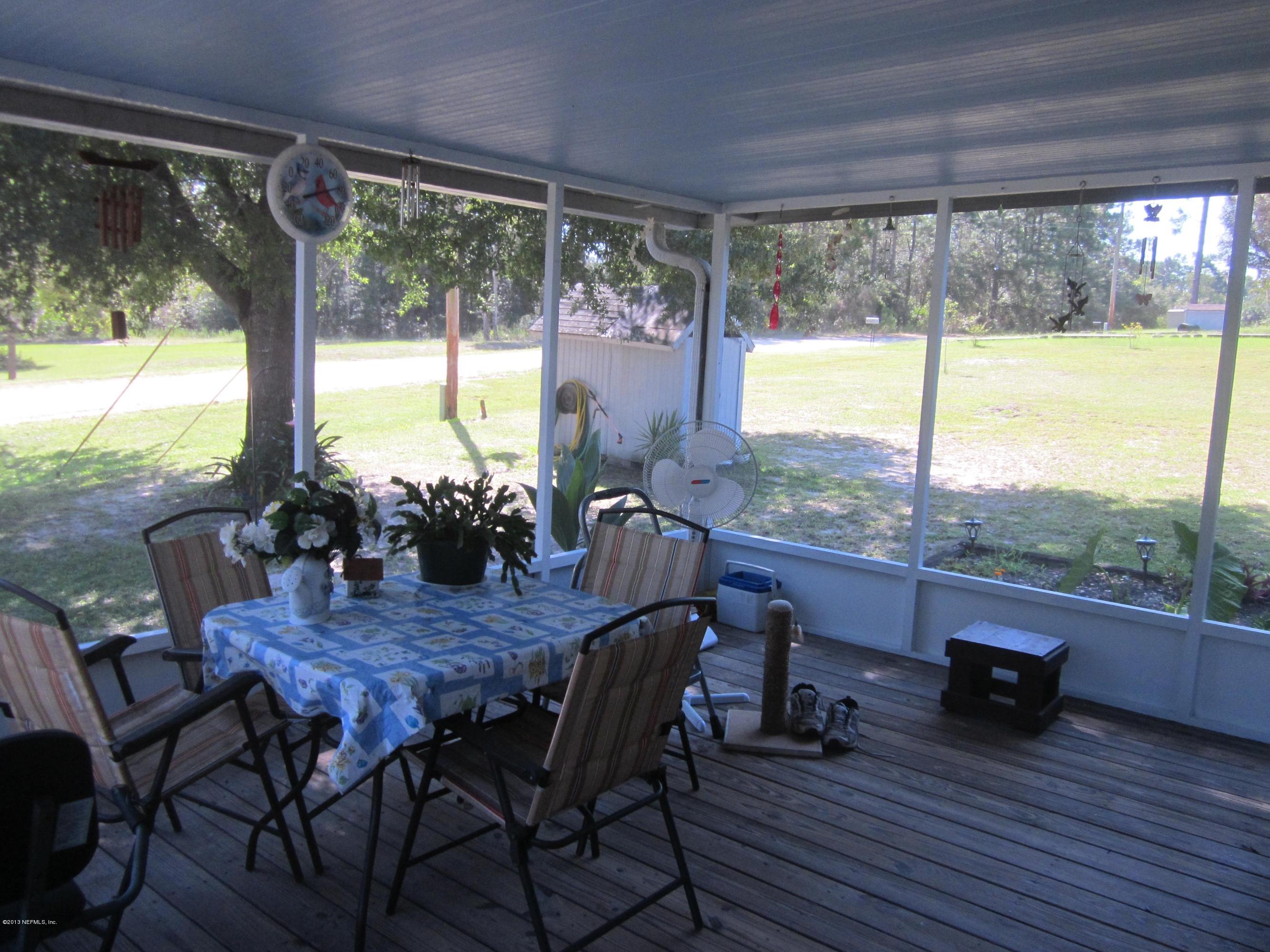 219 Deer Run Road Satsuma, FL 32189 - Photo 11 of 18 Front screen porch