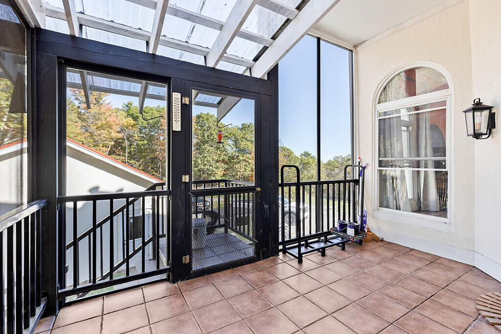 105 South Pond Road Winslow, ME 04901 - Photo 11 of 37 Access to the outside from porch