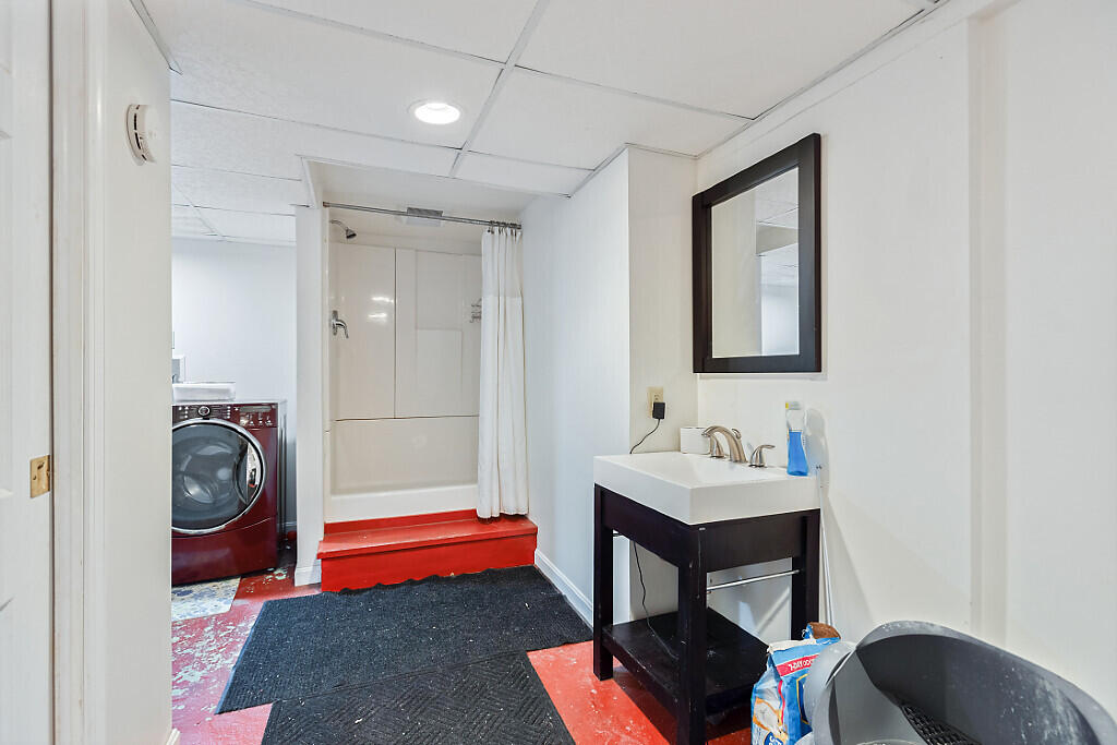 105 South Pond Road Winslow, ME 04901 - Photo 27 of 37 Lower level laundry, shower and sink