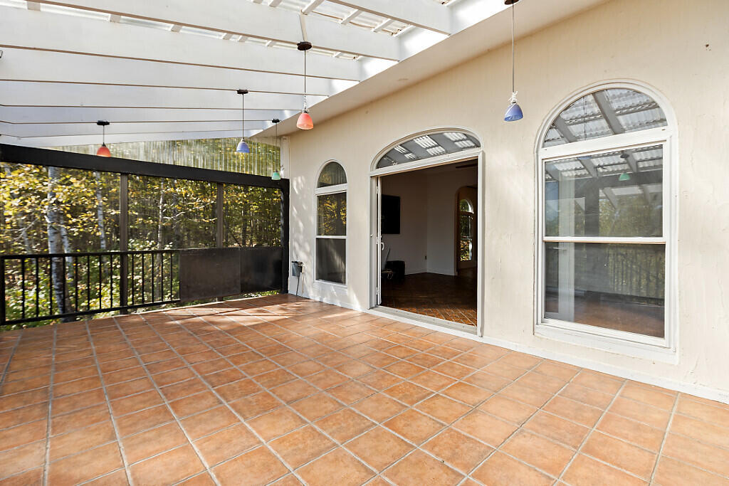 105 South Pond Road Winslow, ME 04901 - Photo 10 of 37 Enclosed front porch