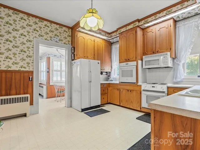 a bathroom with sink and a window