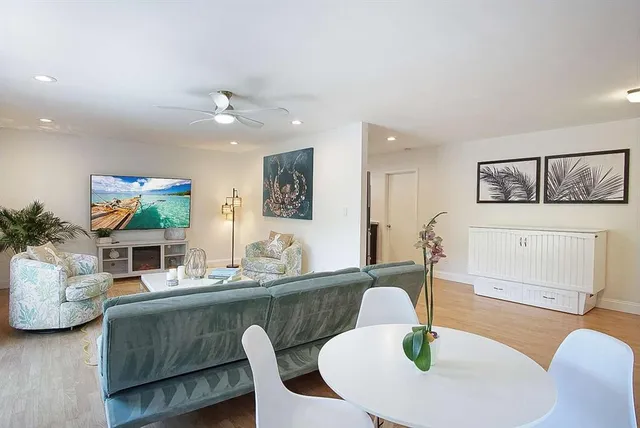 a view of a dining room with furniture window and outside view