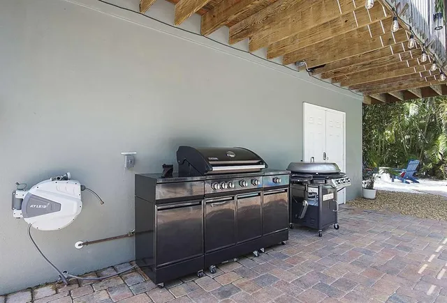 a view of swimming pool with sitting area