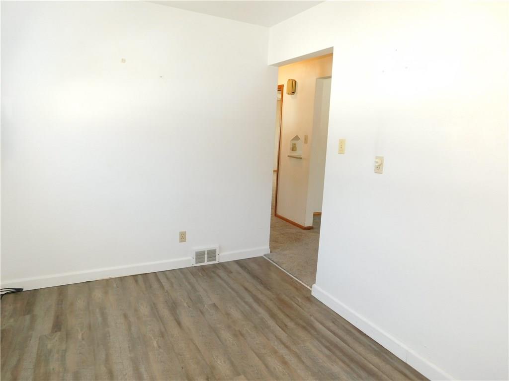 1086 White Cloud Road Apollo, PA 15613 - Photo 8 of 21 Neutral and new- hard wood flooring in the eat-in kitchen.