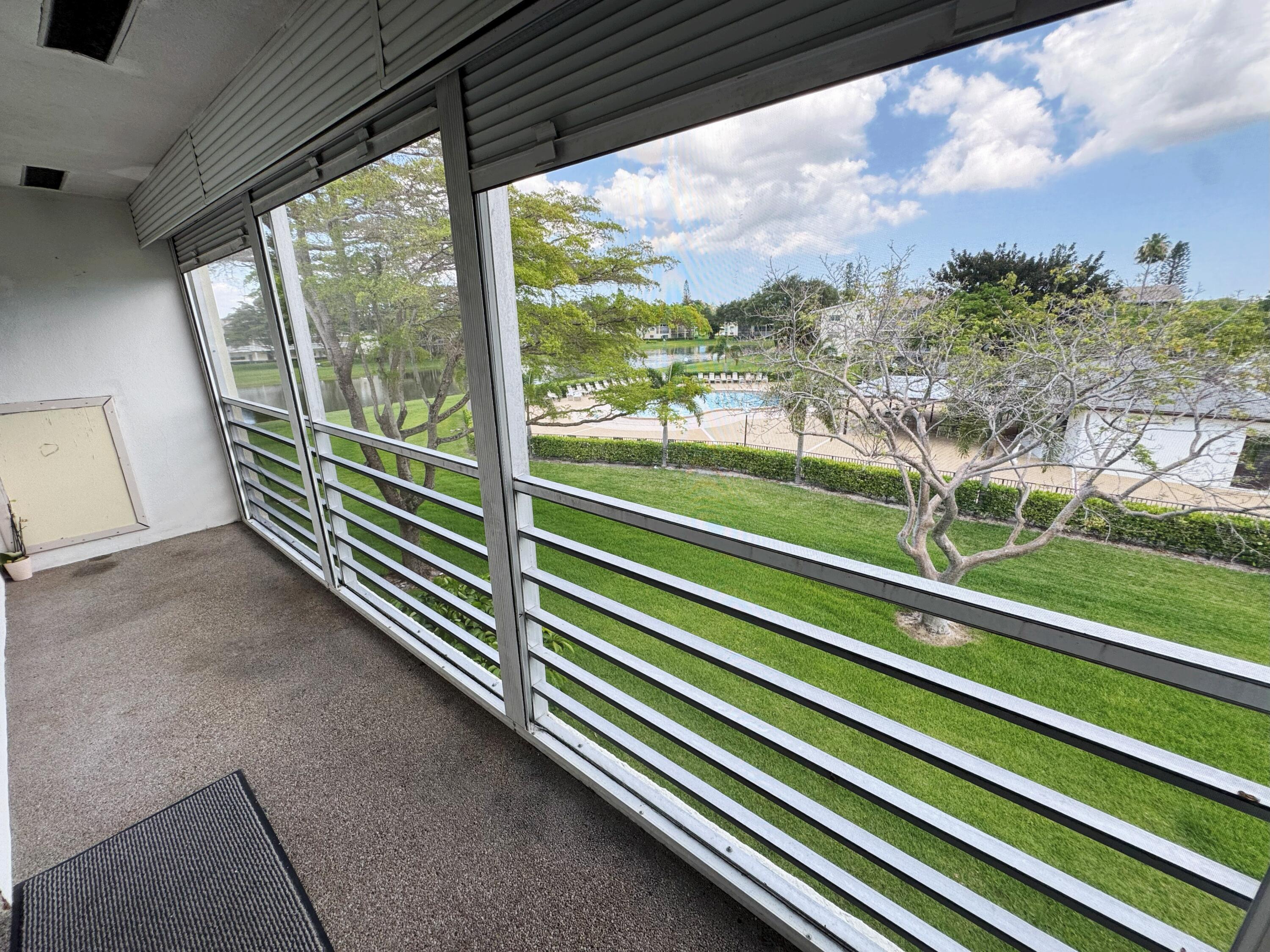 125 Dorset C Boca Raton, FL 33434 - Photo 2 of 24 pool view