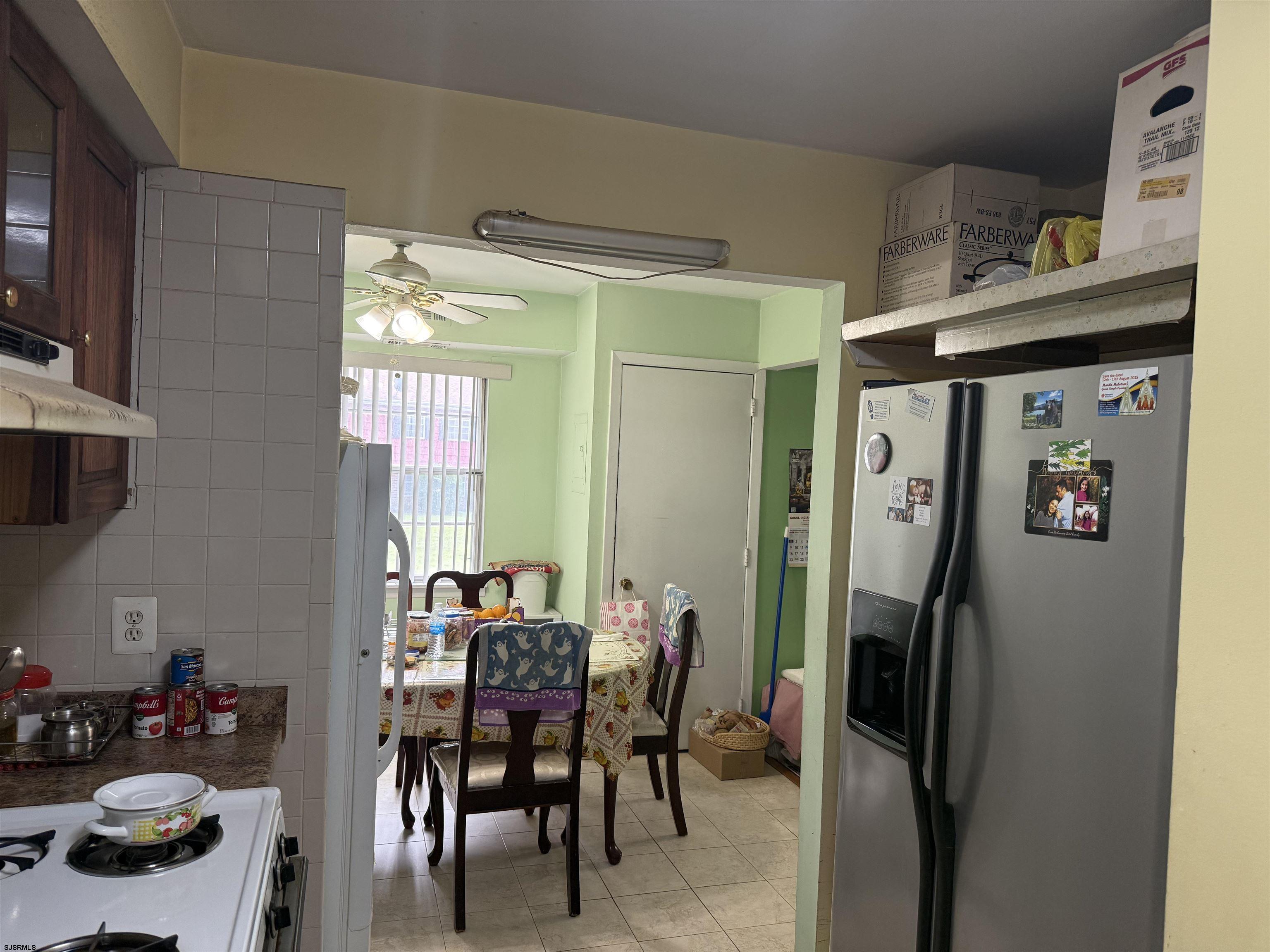 720 South New Road, Unit 5M Absecon, NJ 08201 - Photo 4 of 14 a dining room with furniture and window