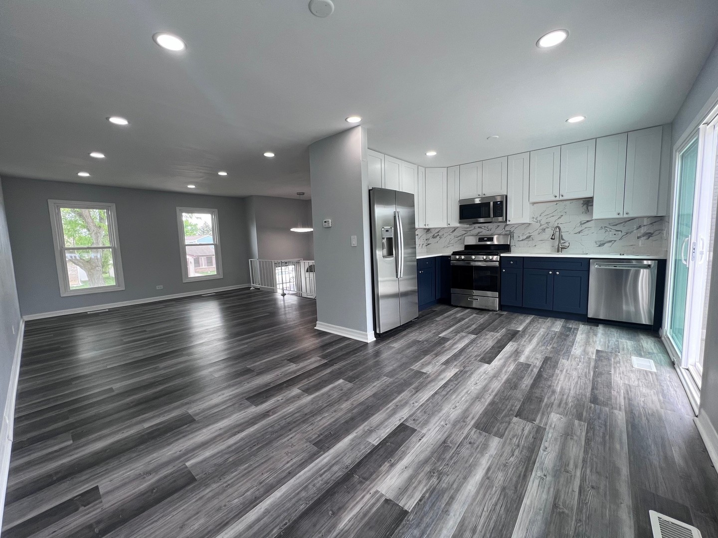 1170 Singleton Drive Roselle, IL 60172 - Photo 12 of 42 a large kitchen with stainless steel appliances granite countertop lots of counter top space and a refrigerator