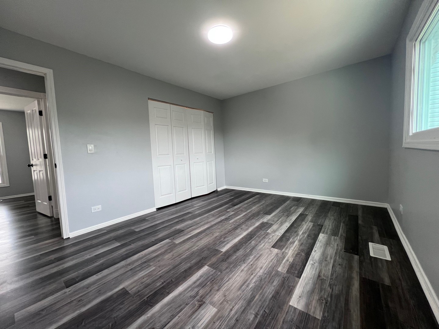 1170 Singleton Drive Roselle, IL 60172 - Photo 22 of 42 wooden floor in an empty room