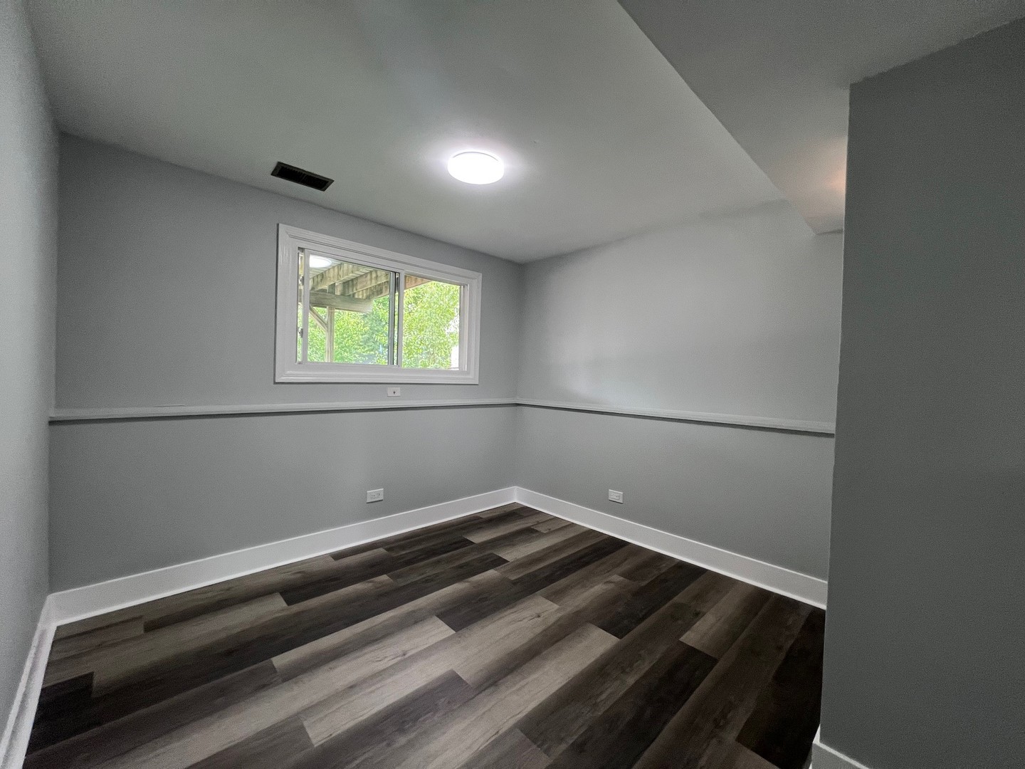 1170 Singleton Drive Roselle, IL 60172 - Photo 38 of 42 an empty room with wooden floor