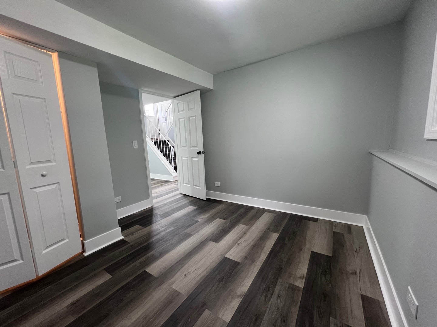 1170 Singleton Drive Roselle, IL 60172 - Photo 39 of 42 a view of a room with wooden floor