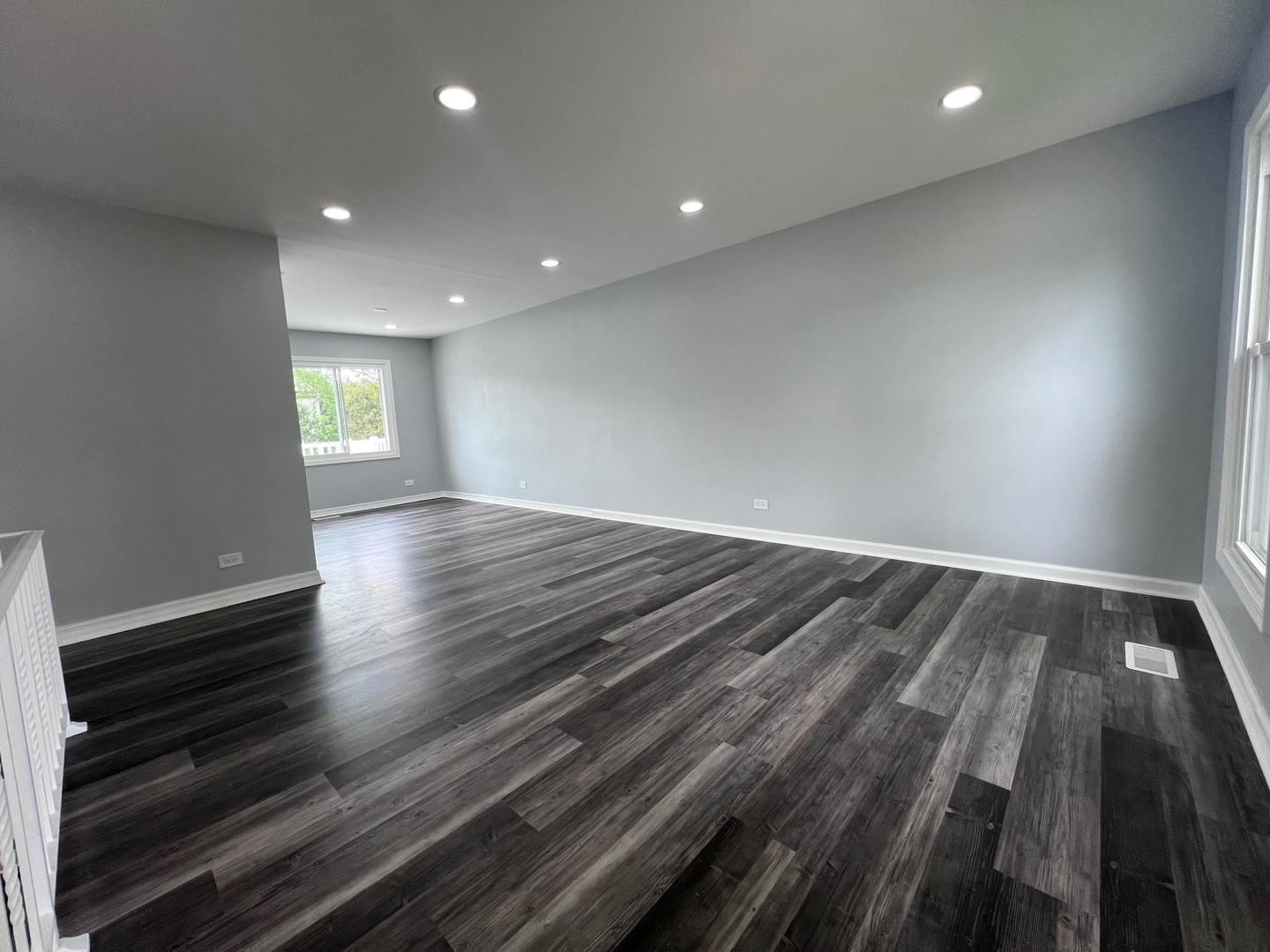 1170 Singleton Drive Roselle, IL 60172 - Photo 10 of 42 an empty room with wooden floor and windows